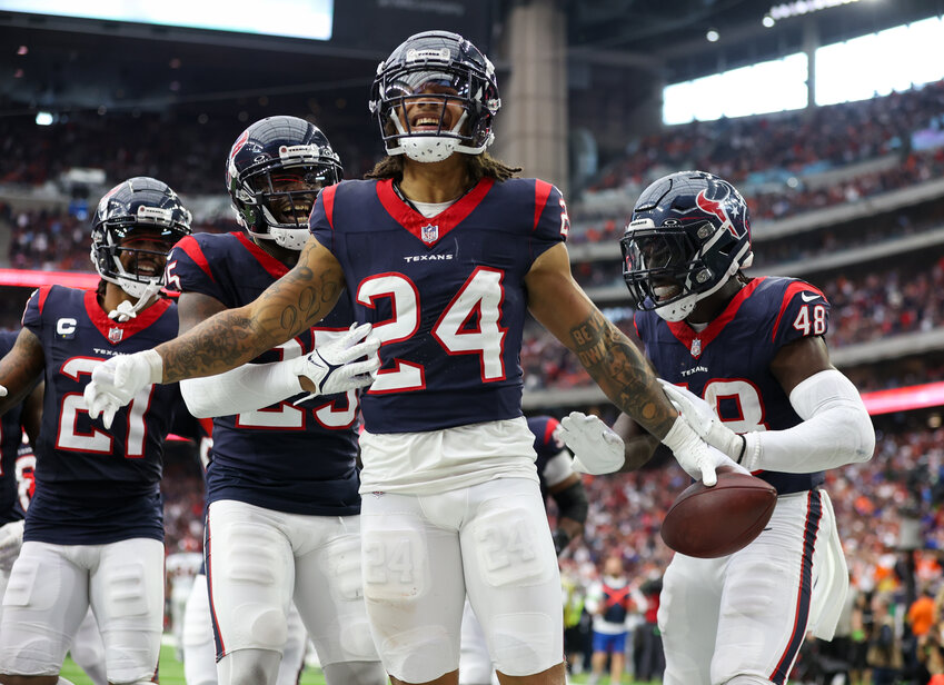 Texans cornerback Derek Stingley Jr. (24) celebrates after intercepting a pass from Broncos quarterback Russell Wilson during an NFL game between the Texans and the Broncos on December 3, 2023 in Houston. The Texans won, 22-17.