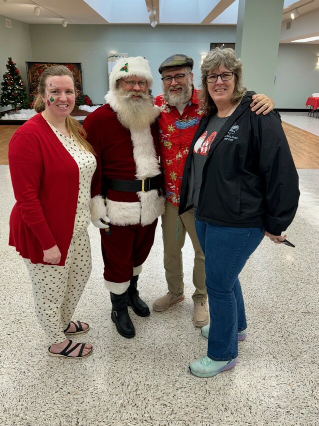 Also enjoying breakfast with Santa at Brookshire Convention Center on Dec. 2 are (left to right) Julie Arciniaga , Santa , Tony McAnelly and Lori McAnelly.