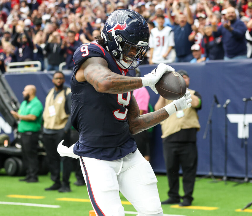 Texans tight end Brevin Jordan (9) dances after scoring a touchdown on a 12-yard pass reception during an NFL game between the Houston Texans and Tennessee Titans on December 31, 2023, in Houston. The Texans won, 26-3.