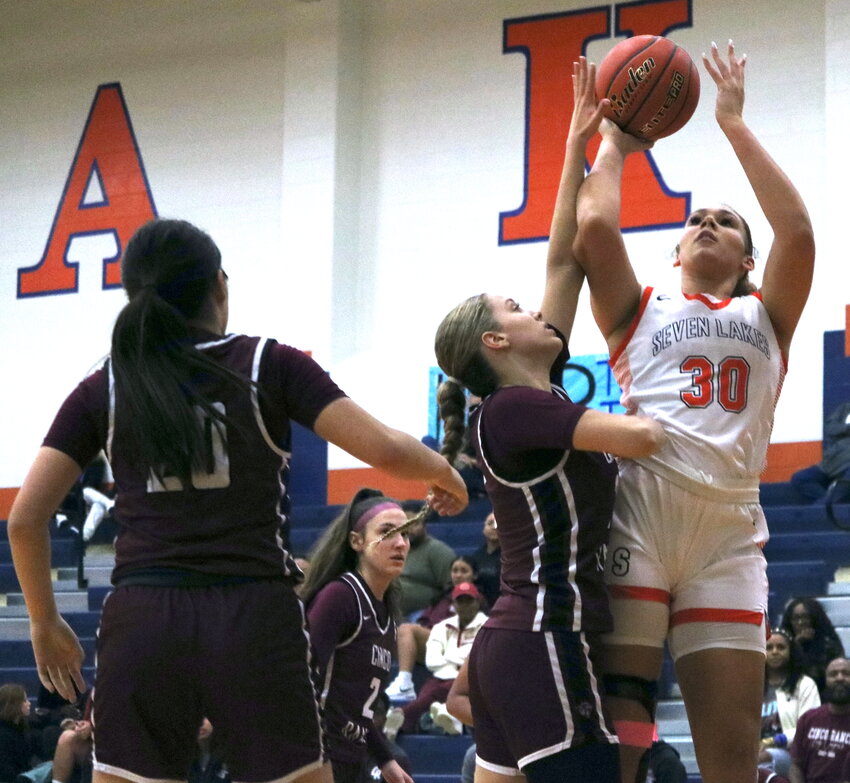 Justice Carlton goes up for a layup during Friday&rsquo;s game between Seven Lakes and Cinco Ranch at the Seven Lakes gym.