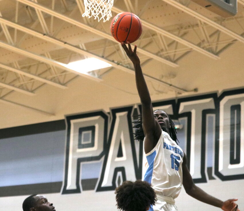 Ade Onaleye shoots a layup during Wednesday&rsquo;s game between Paetow and Jordan at the Paetow gym.
