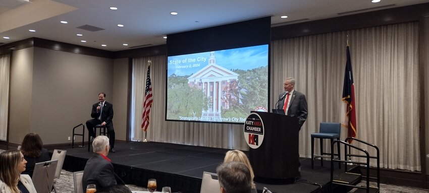 City of Katy City Administrator Byron Hebert (left) and Mayor Dusty Thiele address a capacity crowd at the Katy Area Chamber of Commerce&rsquo;s &ldquo;State of the City&rdquo; luncheon on February 2nd at Embassy Suites, 16435 Katy Freeway.