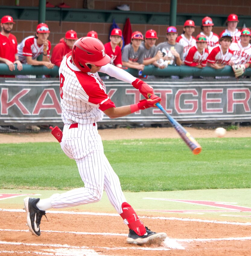 Ashten Ballew hits during a game between Katy and Ridge Point at the Katy baseball field.