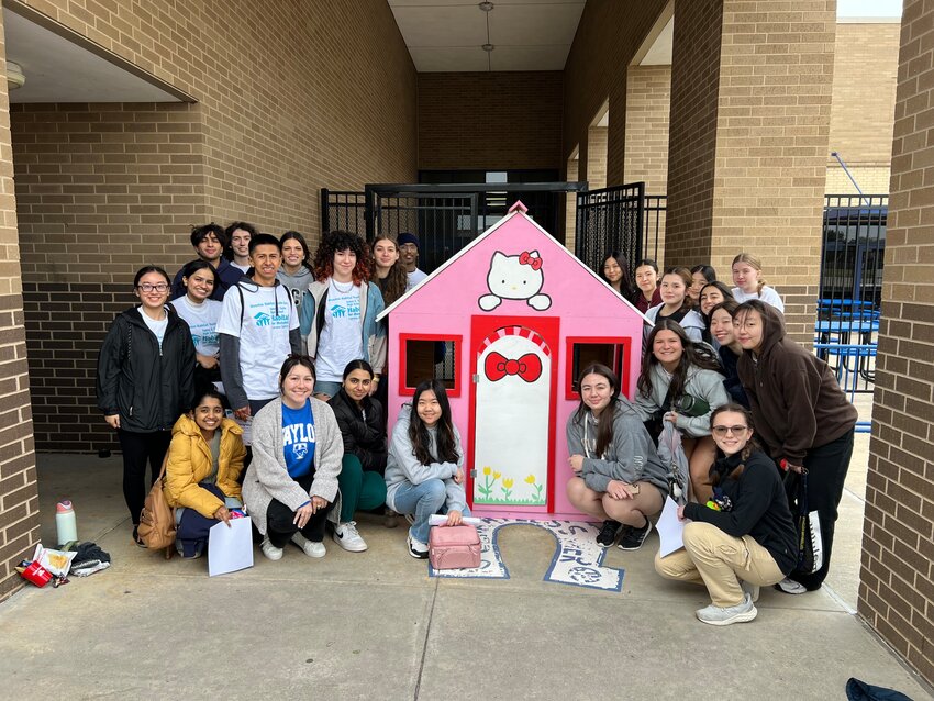 Students from Taylor High School came together on February 17th to build a playhouse and to learn about financial literacy, through a Habitat for Humanity program funded by State Farm.