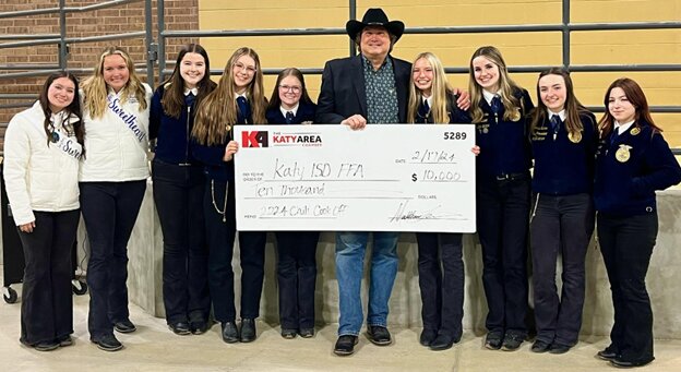Bill Lacy of Independent Financial Mortgage (center) presents a check for $10,000.00 to Katy ISD FFA Chapters to the nine FFA chapter presidents, on behalf of the Katy Area Chamber of Commerce. The funds, raised through the Chamber&rsquo;s annual Chili Cookoff specifically to benefit KISD FFA, were presented on Saturday, February 17th at the buyers&rsquo; luncheon. The 2024 cookoff, which Lacy chairs, has been rescheduled for April 20th at the parking lot of American Furniture Warehouse. For more information, go to business.katychamber.com/chamber-calendar.