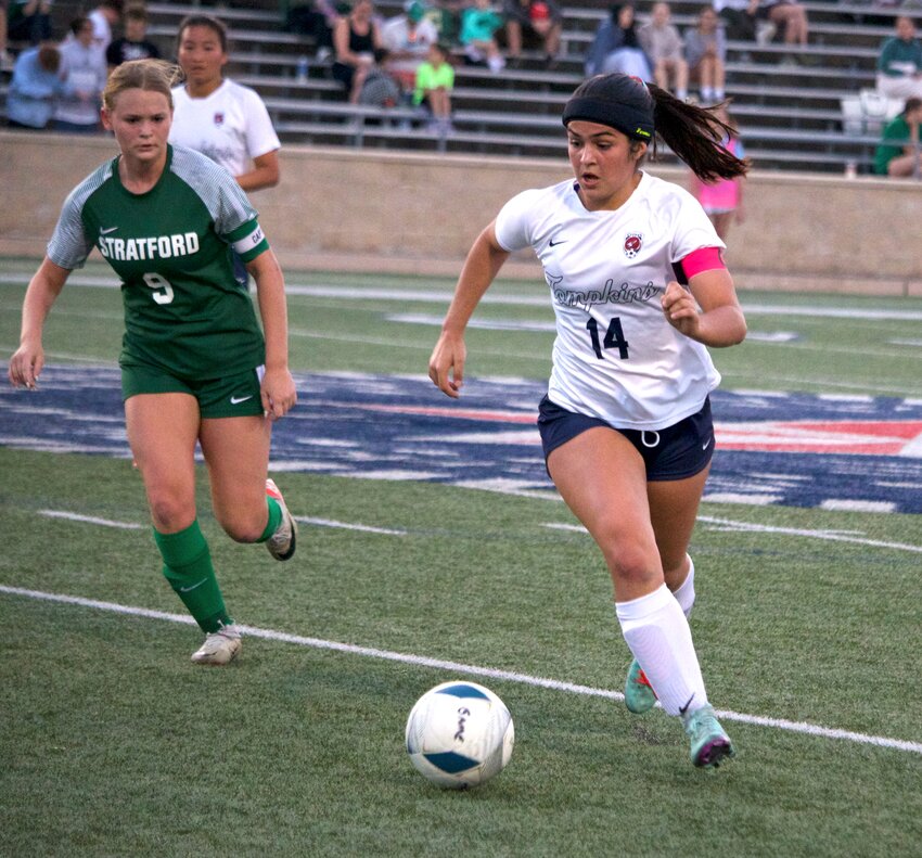 Paula Fuentes dribbles past a defender during Thursday&rsquo;s area round game between Tompkins and Stratford at Tully Stadium.