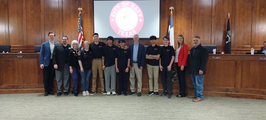 Members of the Katy High School robotics team and their coach Thea Drake (fourth from left) were recognized at Monday night&rsquo;s city council meeting for winning the UIL state championship and the Think Award for Superior Programming.