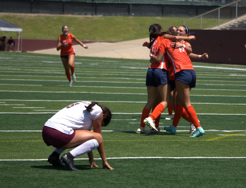 Seven Lakes celebrates a goal during Friday's Region III-6A Semifinal between Seven Lakes and Pearland in Deer Park.