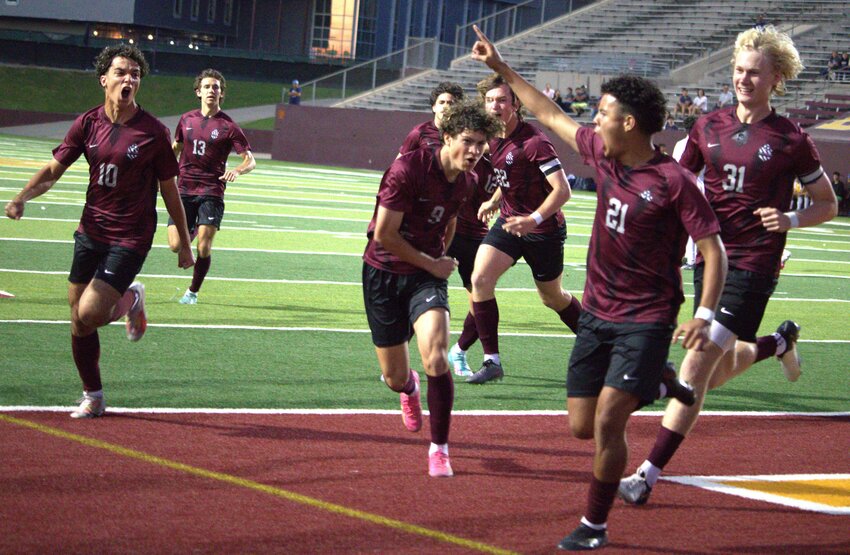Cinco Ranch celebrates after Adrian Correa scored a goal during Friday's Region III-6A Semifinal between Cinco Ranch and Kingwood in Deer Park.