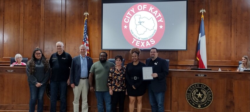 In a proclamation read by Mayor Pro Tem Chris Harris (on far right) at Monday night's city council meeting, council member and Mayor Dusty Thiele (third from left) recognized the achievements of the city&rsquo;s dispatchers by declaring April 16-20 as National Public Safety Telecommunications Week.