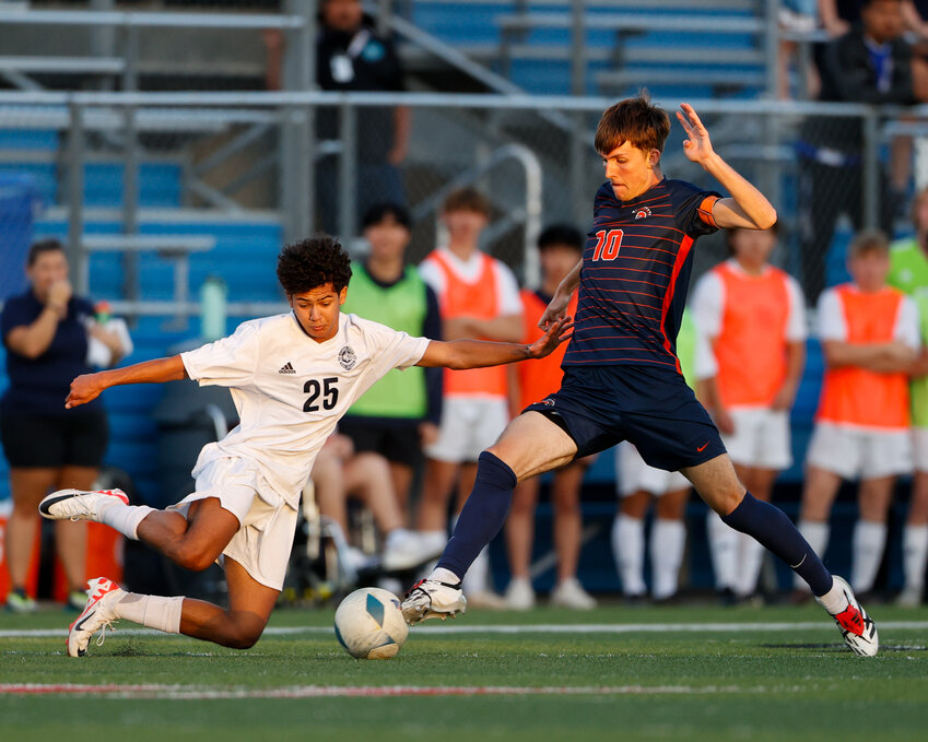 Flower Mound midfielder Luis Garc&iacute;a (25) makes a tackle on Seven Lakes defender Aidan Morrison (10) during the Class 6A boys state soccer championship between Seven Lakes and Flower Mound on April 13, 2024 in Georgetown.