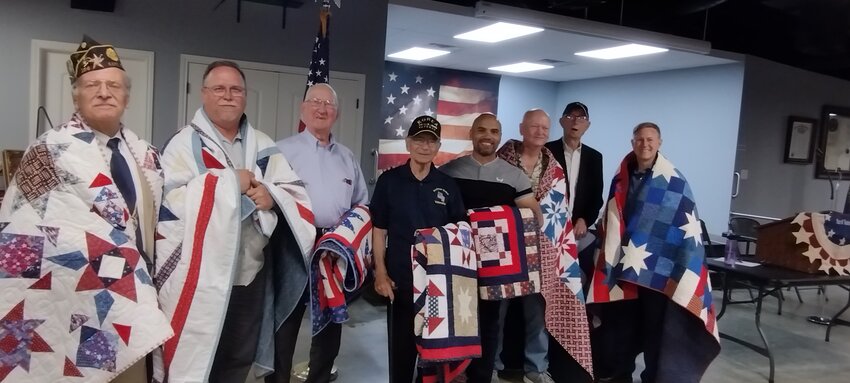 Society of the Daughters of the American Revolution. Honorees, who were nominated by community members, included: (left to right): Will Miller/Army, Gerald Powell/Army, Dana Enos/Army Air Corps, Herb Berkowitz/Army, Joshua Allen/Navy, Frank Hawthorne/Coast Guard, Larry Arnold/Navy and Russell Holmes/Coast Guard.