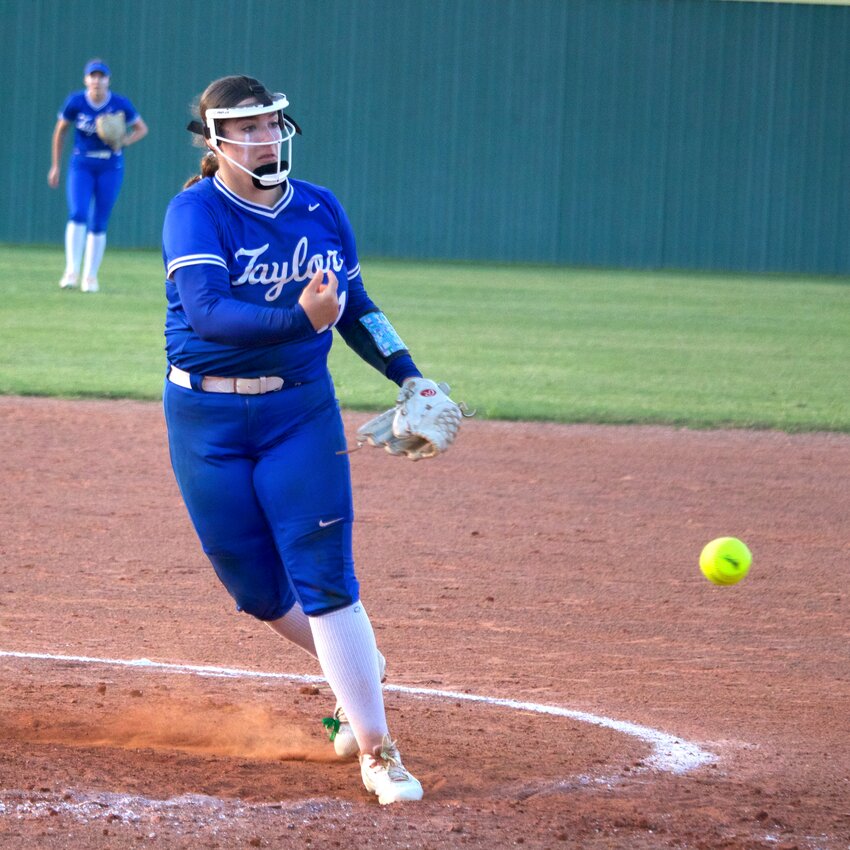Ari Hughes pitches during Wednesday's bi-district round game between Taylor and Ridge Point at the Jordan softball field.