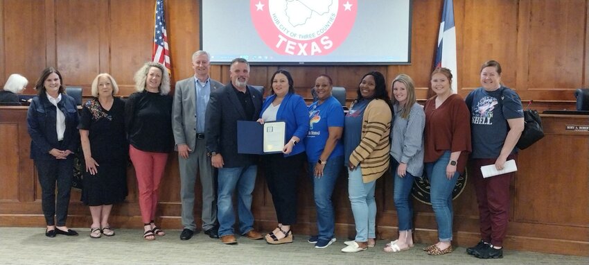 Shown with the city council&rsquo;s special proclamation recognizing May 6-10 as Teacher Appreciation Week are (left to right) Jacalyn Warner, Jamie Wolman, Winborn Elementary principal Lisa Frison, Katy Mayor Dusty Thiele, Councilmember Rory Robertson, Tays Junior High School principal Tara Haworth, Ina Gill, Bria Morris, Kelsey Berckenhoff, Emily Quinn and Gail Smith.