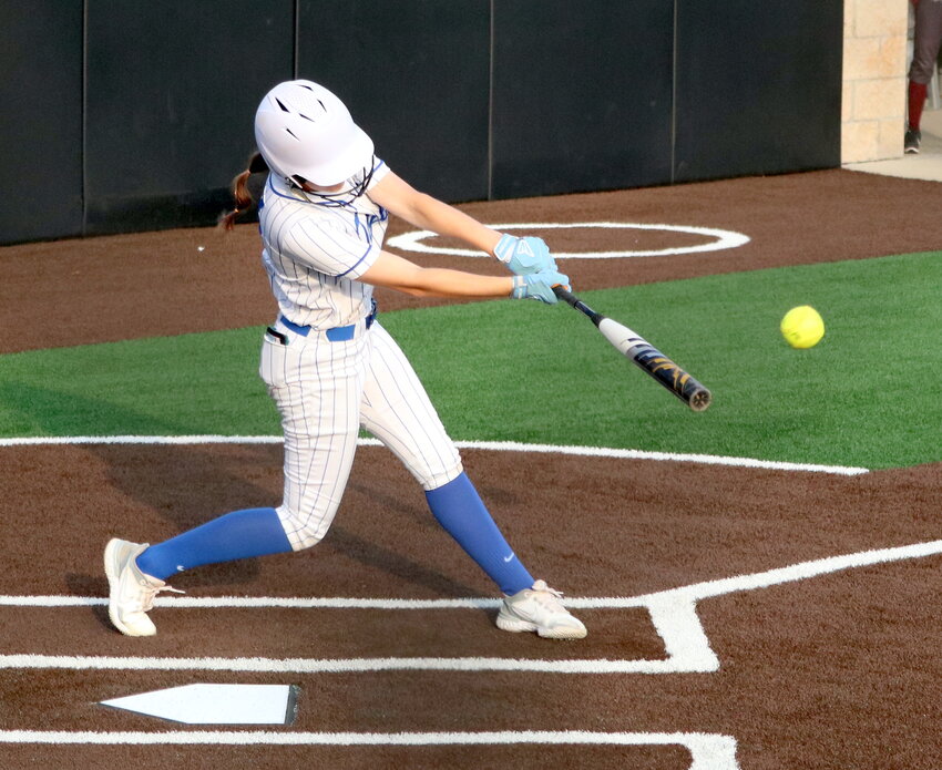 Izzy Allen hits during Friday&rsquo;s area round game between Taylor and the Height at Cy-Park.