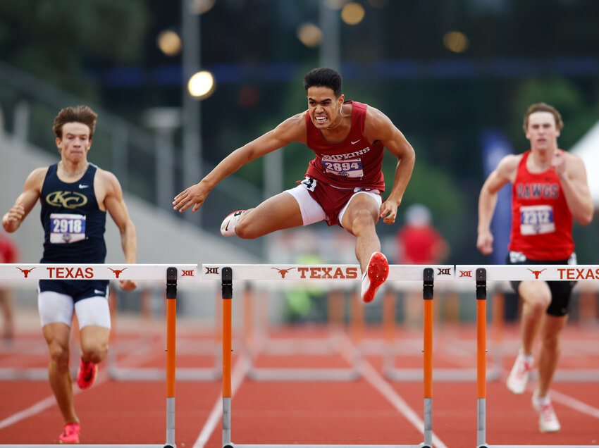 Jayden Keys of Tompkins (2894) clears the final hurdle in the Class 6A boys 300-meter hurdles at the UIL State Track and Field Meet on Saturday, May 4, 2024 in Austin. Keys won the race with a time of 36.28 seconds.