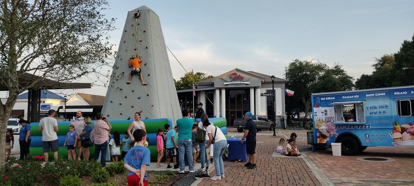 Kids await their turn to try the &ldquo;rock wall&rdquo; at the City of Katy&rsquo;s Friday Night Heights event on May 10th at Second Street and C in old town Katy.