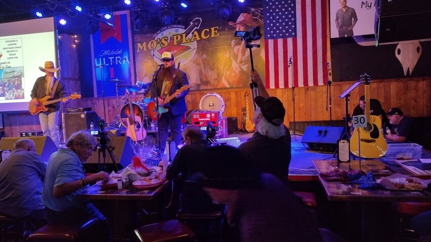 Sundance Head (right), winner of the 2016 season of The Voice, performs at Texas Best Music Fest held Sunday at Mo&rsquo;s Place, 21940 Kingsland in Katy. The concert, spearheaded by Grammy&reg; winning singer-songwriters Bill and Kim Nash, raised money for Champions Kids Camp, which helps children who have survived a traumatic injury, illness, or personal loss, such as the loss of a parent or sibling.