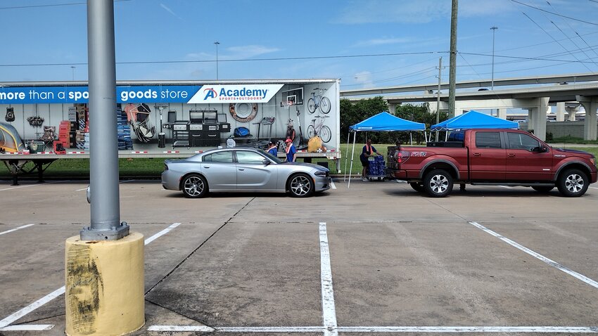 On Wednesday, July 10 Katy area residents were able to get free water at the Academy Sports + Outdoors store at23155 Katy Freeway in Katy. Starting at 9 a.m., five Academy stores across Houston distributed free 24-packs of bottled water to help those affected by Hurricane Beryl. Customers were directed to look for the 18-wheeler parked in front each of the five stores to pick up their free case of bottled water (no purchase necessary). Academy planned to donate nearly 8,000 24-packs of water in total to the greater Houston area, according to a company press release.