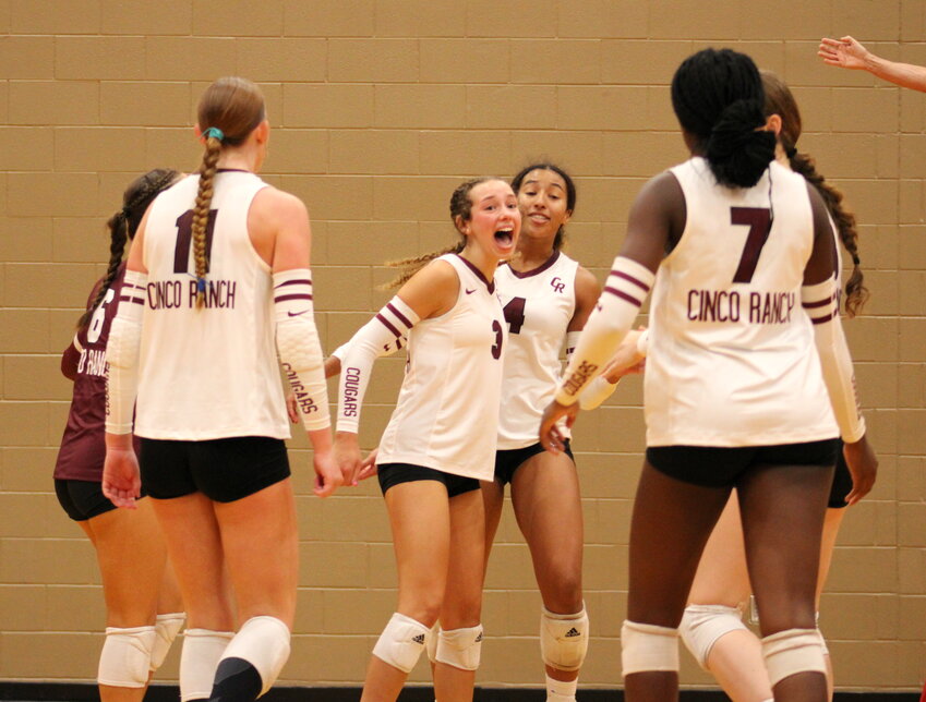 Cinco Ranch players celebrate after a point during Saturday&rsquo;s Katy ISD/Cy-Fair Volleyball Classic Gold Bracket game.