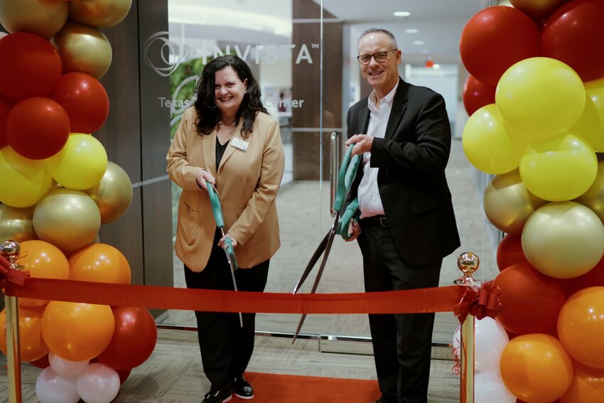 Nancy Kowalski, executive vice president for upstream nylon (left), and Brook Vickery, president and CEO of INVISTA cut the ceremonial ribbon on February 11 to open the company&rsquo;s new Texas Technology Center in Katy.