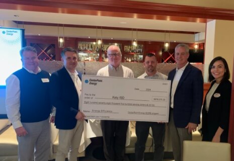 CenterPoint Energy presented Katy ISD's Maintenance and Operations Department with a rebate for the amount of $878,570.33.