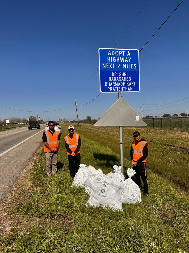 volunteers from Dr. Shri. Nanasaheb Dharmadhikari Pratishthan (DSNDP) participated in an Adopt-A-Highway cleanup drive, collecting 150 pounds of trash in Fort Bend County near Needville.