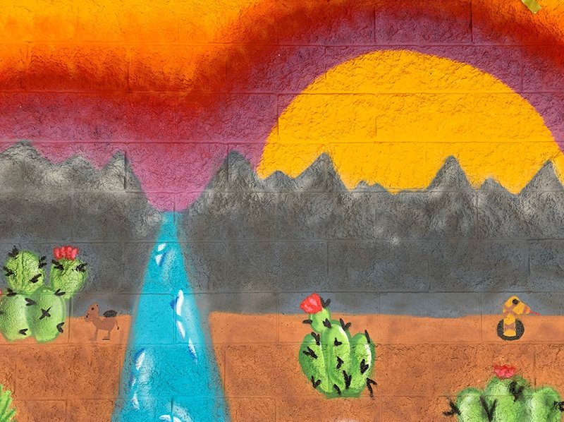 The future Organ Mountain High School (currently Oñate High School) students Tahlor Triolo and Sarahi Alvarado, painted the “Preserve Wildlife” mural. Four student created murals at the school entrance were unveiled as part of the rebranding of the school’s name. The name change is official on July 1.