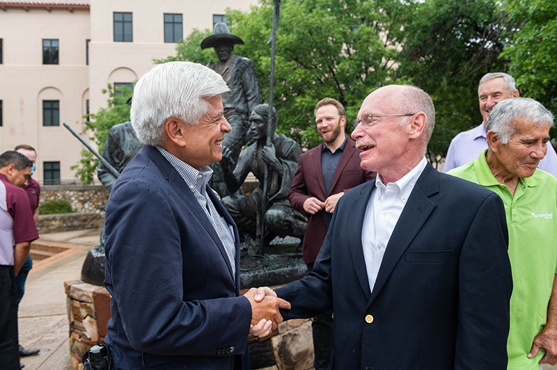 New Mexico State University Chancellor Dan Arvizu, left, shares a laugh with Nusenda Credit Union President and CEO Joe Christian, an NMSU alumnus. Nusenda announced a $3 million gift to NMSU to support two student-centered projects: the Nusenda FinTech Lab at Arrowhead Center and the Nusenda Center for Financial Capability at the NMSU Student Success Center.