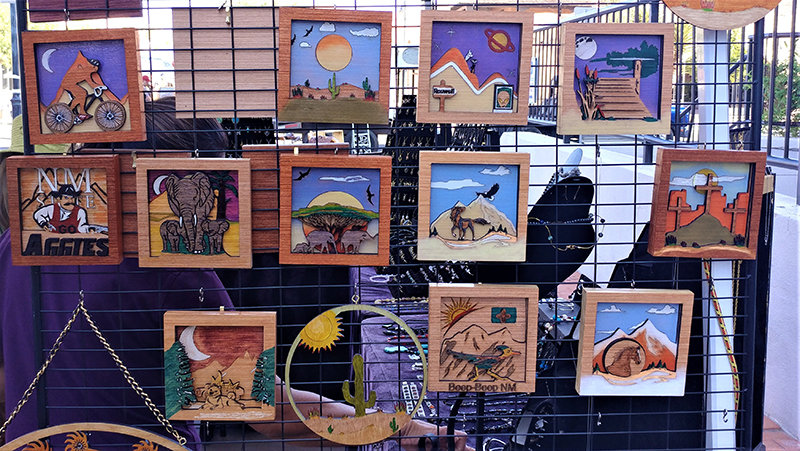 Marcella Huppke’s custom-created scene plaques are for sale at the Las Cruces and Mesilla farmers markets. Huppke, originally from New York state, moved to Las Cruces two years ago.