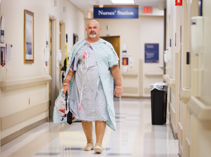 Madison-Ridgeland Academy Head Football Coach Herbert Davis makes laps around the hospital after surgery.