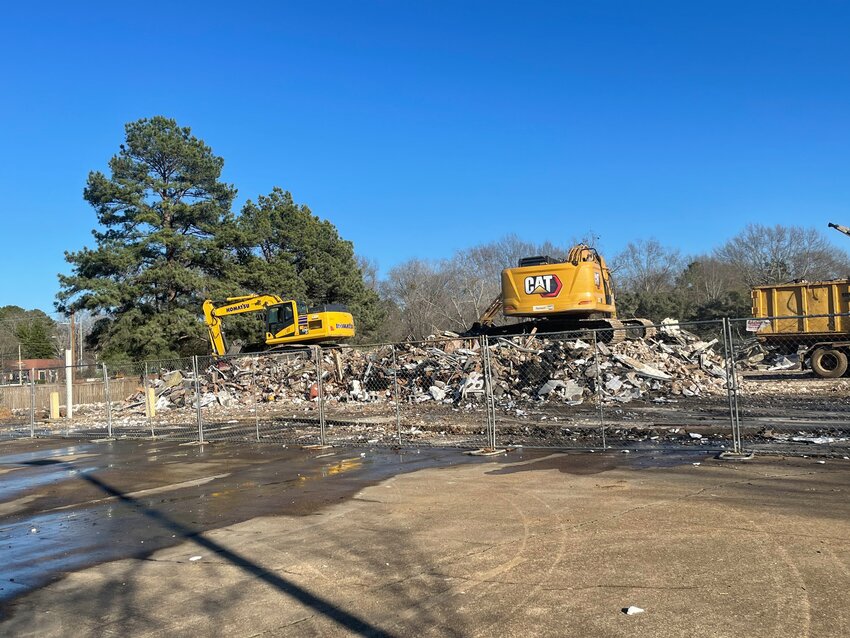 Crews tear down the former Ridgeland City Hall building located on U.S. Highway 51 weeks after a contractor accidentally tore down a section.