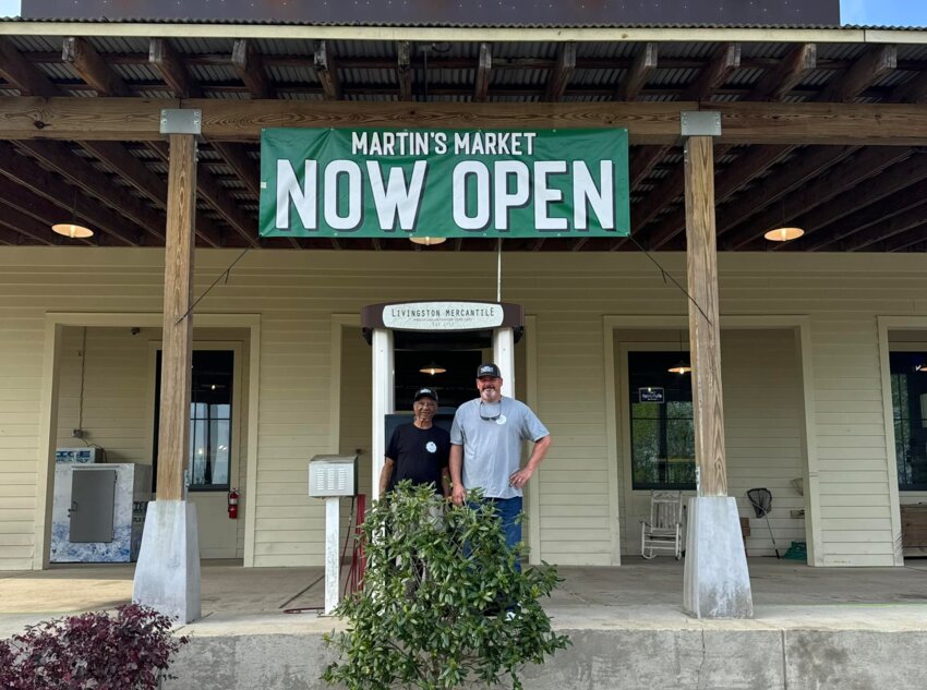 Martin’s owner Joseph Stodghill with long time employee Johnny Melton in front of the newly opened and renovated Martin’s Market in Livingston.