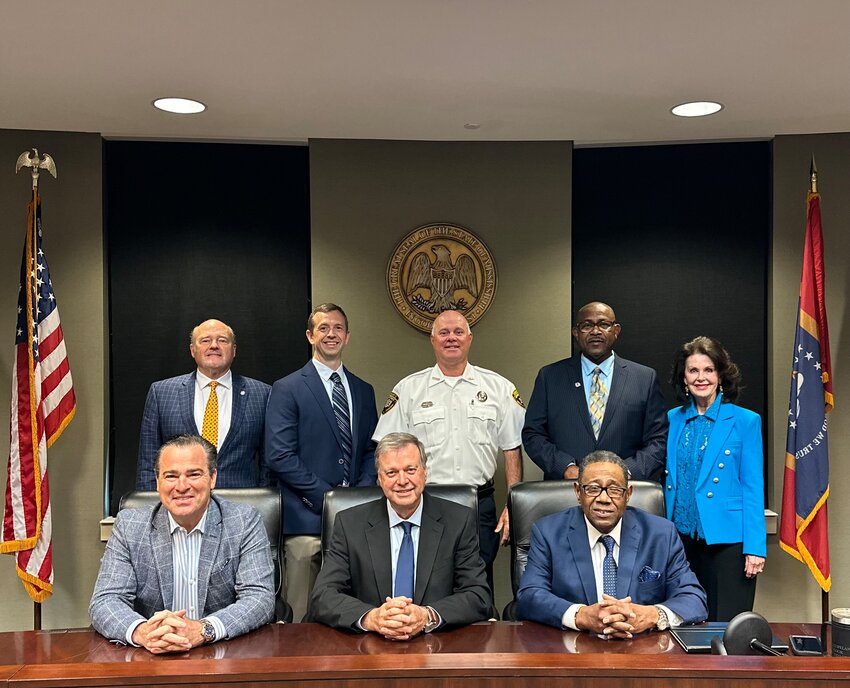 Pictured, front row from left, are Supervisors Trey Baxter, Gerald Steen and Karl Banks (Back) Madison County Chancery Clerk Ronny Lott; Supervisor Casey Brannon; Sheriff Randy Tucker; Supervisor Paul Griffin; Jan Collins, Executive Director at MCBL&F.