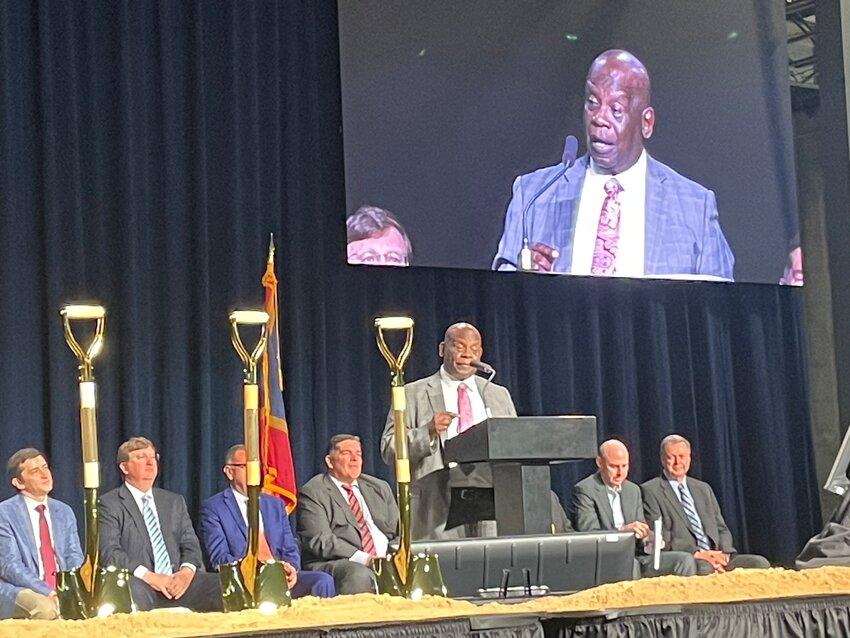 AWS executives gather with state and local officials for a ceremonial groundbreaking on the new $10 billion Madison County data centers last May. Canton Mayor Dr. William Truly addressed the crowd.