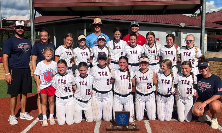 Pictured, front row from left, are Kady Rose Carter, Avery Palmer, Bailey Jenkins, Annah Perry, Caroline Horton, Ainsley Rymer, Kinsley Horton, Asst. Coach Alexis Grantham (Middle) Head Coach Michael Shumaker, Asst. Mallory Little, Bat Girl Grace Rawls, Ada Wallace, Sydney Allen, Berkley Wallace, Presley Riley, Skye Grantham, Merritt Jourdan, Summer Leigh Develle, Georgia Burgess (Back) 
Asst. Logan Clayton, and Asst. Wesley Grantham.