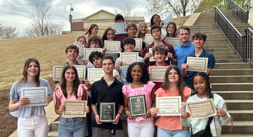 St. Joseph Catholic School’s high school, student-produced newscast “Bruin News Now” was
named the state’s Newscast of the Year and the seventh-grade student-produced newscast “JV
Bruin News Now” was named the state’s Middle School Newscast of the Year. Both awards
were among 25 that St. Joe received at the Mississippi Scholastic Press Association spring
convention Friday, March 28, 2025, on the campus of the University of Mississippi. Pictured here are, back row from left: Elizabeth Vanderloo, Colby Jones, Mary Alice Foster and Amari Alexander. Fourth row: Macon Ogburn, Audrey Young, Davis Hammond and Emma O’Brien.
Third row: Camp Hlavac, Jason Paul Buckley, Sawyer Helms, Jonathan Warnock and Luke Jones.
Second Row: Turner Brown, Alex Hood and Noah Sanders. Front row: Landry Erwin, Sofia Liberto, Thierry Freeman, McKenzie Cummings, Kaitlyn Evans and Addyson Russell.