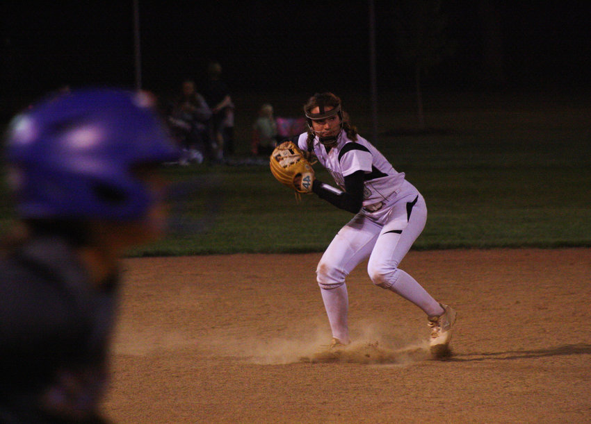 Centralia senior shortstop Jozelynn Bostick fields a ground ball to throw out a Fatima runner going down the line Thursday in Centralia. The Lady Panthers lost 8-2 to the No. 2 team in Class 3.