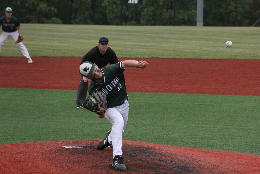 North Callaway senior Davis Woods pitches against South Callaway in relief on Monday in the Class 3 District 7 tournament at South Callaway in Mokane.