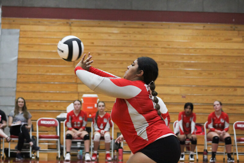 Mexico sophomore JaClynn Cline sends a ball over the net during a match this season.
