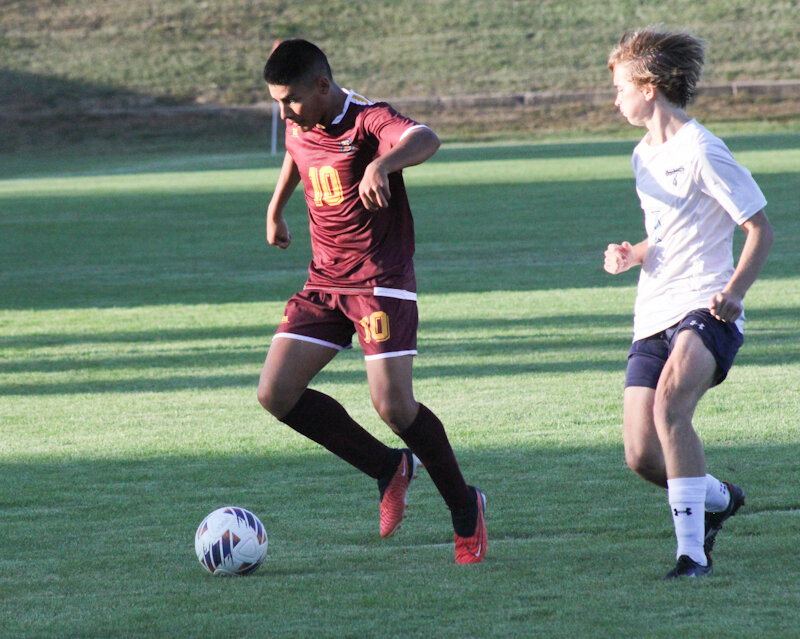 Missouri Military Academy sophomore Carlos Ontiveros keeps the ball away from a defender this season.