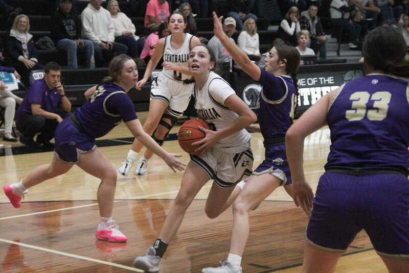 Centralia freshman Ryenn Gordon takes the ball into the lane against Hallsville during the Centralia Invitational Tournament.