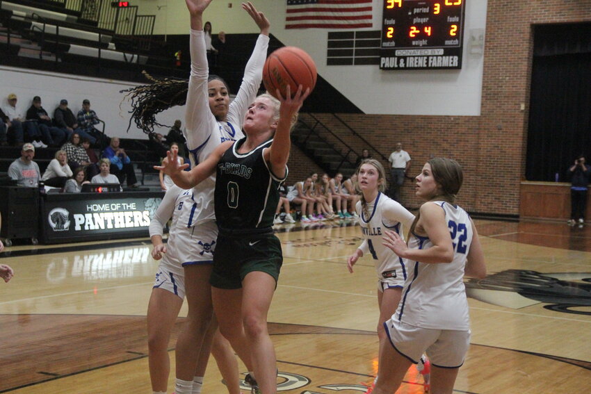 North Callaway senior Abrielle Burgher goes up for a shot at the Centralia Invitational earlier this season.