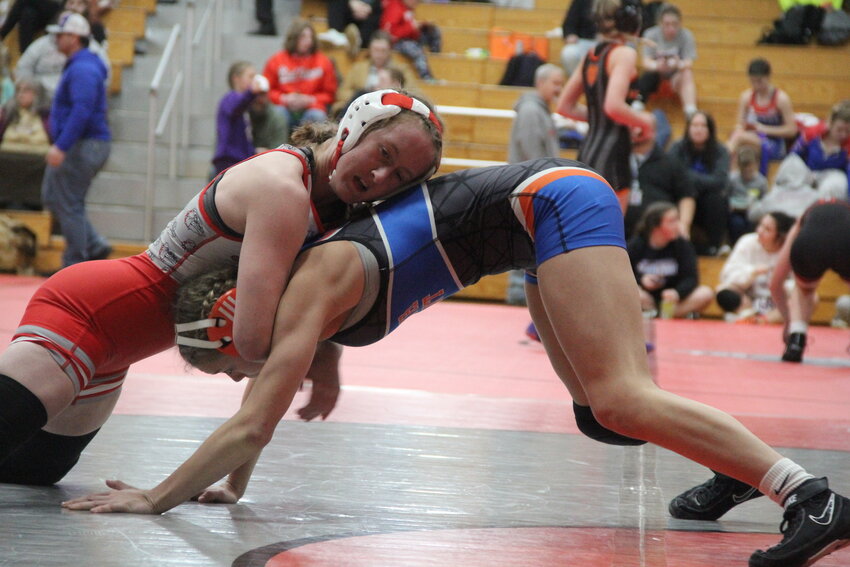 Mexico senior Katie Bowen stays on top of her opponent on Monday at the Mexico Brick City Classic at the Mexico Sports Complex.