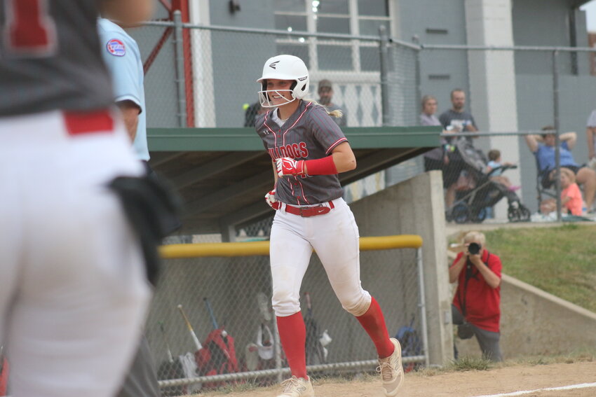 Mexico junior Hannah Loyd jogs home toward a gathering of her teammates after hitting a home run against Hannibal on Thursday at Gallop Field in Mexico.