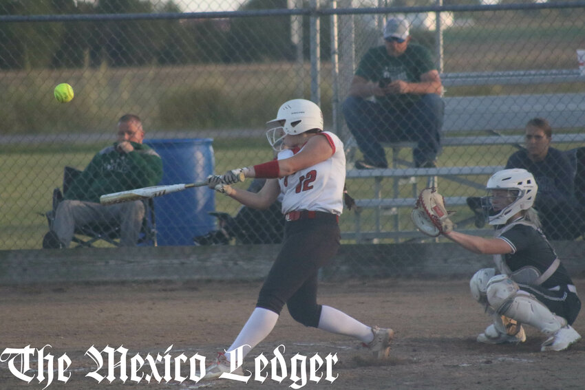 Community R-6 freshman Myla Carroll lifts a pitch deep into the outfield against Westran on Wednesday at home in Laddonia. The play scored two runs, including the winning run.