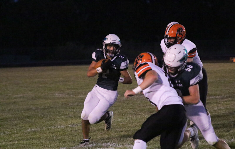 North Callaway sophomore Collin Moore runs with the ball in an earlier home game this season against Macon.