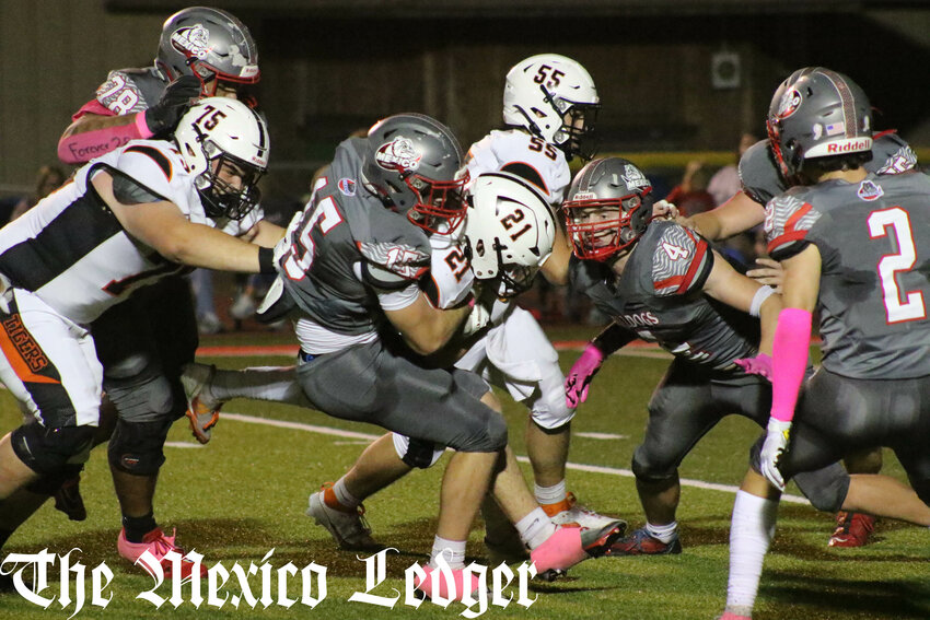 Mexico senior Grant Van Horn tackles Kirksville's Jace Kent during Friday's game at Hawthorne Heights in Mexico.