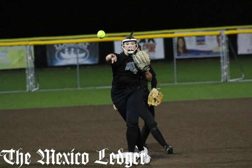 North Callaway senior second baseman Faith Cash makes a throw on the run for an out at first base against Fulton on Wednesday in the Class 3 District 4 tournament at Southern Boone in Ashland.