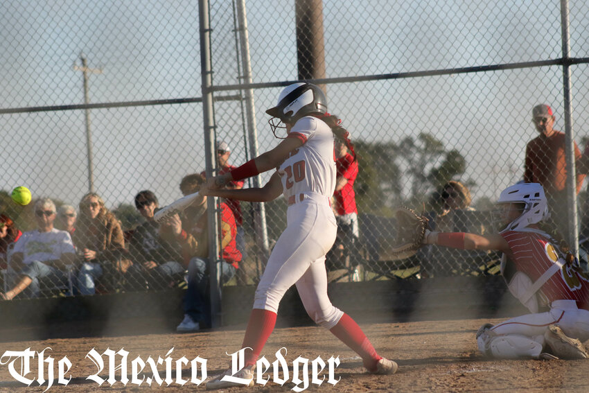 Community R-6 junior Peyton Schafer makes contact with a pitch against North Shelby on Saturday in the Class 1 District 4 semifinals at Community R-6 in Laddonia.